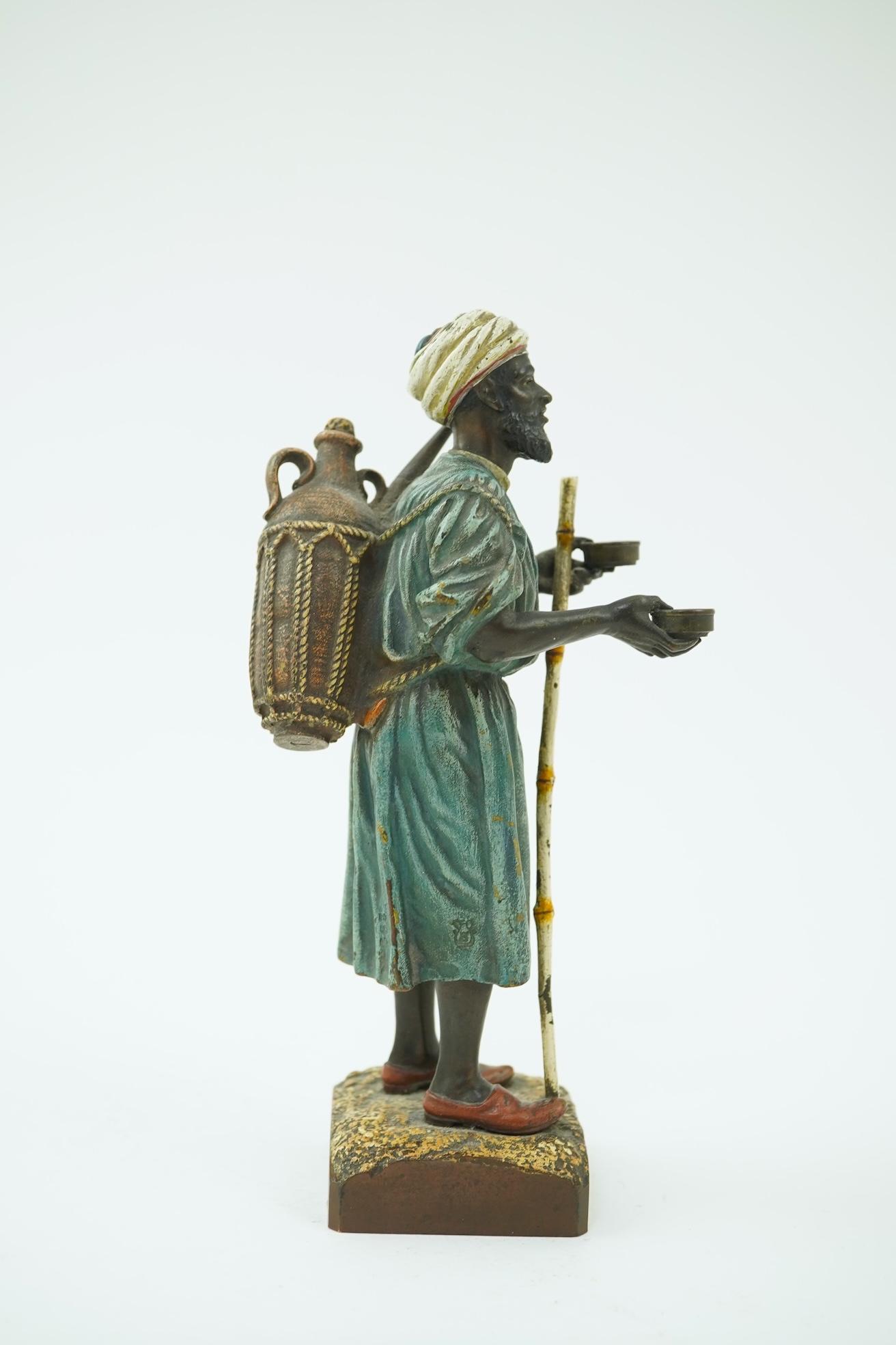 Franz Xavier Bergman (Austrian, 1861-1936). A Viennese cold painted bronze figure of a North African street vendor